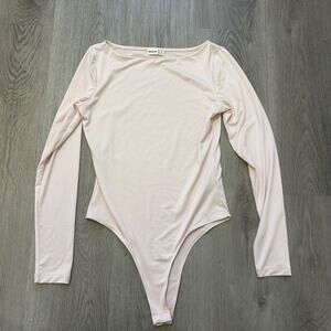 Envie light pink longsleeve snatching bodysuit